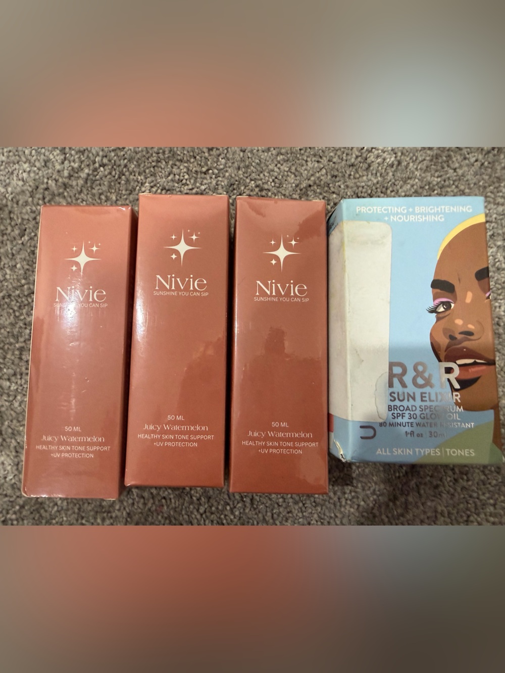 Nivea sunless tanner traps and sun elixer.